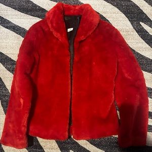 Red Guess fur coat in new condition with inside pockets on each side